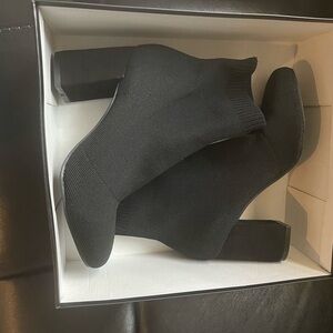 Mia new black boots made of stretchy material size 8.